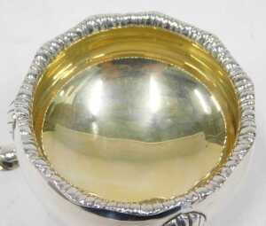 A George VI silver three footed salt, with shaped rim, silver gilt interior, plain circular body... - 3