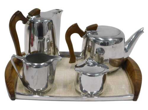 A Picquot ware five piece service, comprising coffee pot, 21cm high, teapot, milk jug, lidded...