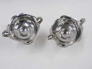 A pair of late Edward VII silver bonbon dishes, each with scroll handles, flared floral rims,... - 2