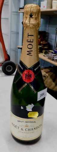 A bottle of Moet & Chandon Brut Champagne, 750ml.