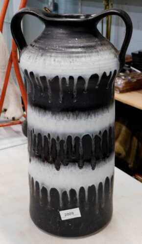 A Carstens fat lava pottery vase, in grey and black drip decoration, marked beneath, 45cm high....