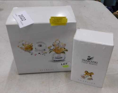 A Swarovski classics boxed crystal memories bell Christmas decoration, 3cm high, and a further...