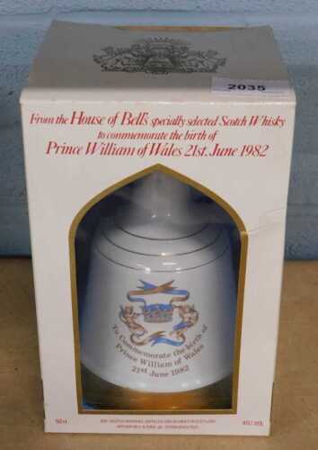 A boxed Prince William of Wales Beswick whisky bell, with contents.