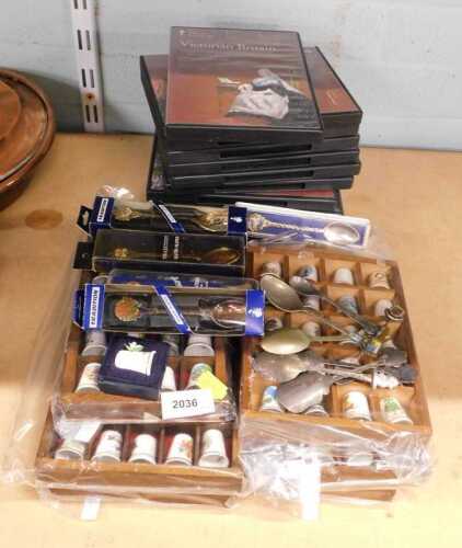 Various collectable thimbles, cased spoons, Victorian Britain DVDs, etc. (a quantity)