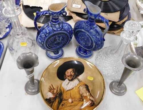 A pair of pewter candlesticks, Ypres style stoneware flasks, ship's decanter, cut glass decanter,...