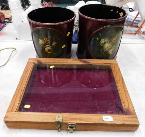 A tabletop display cabinet, with single glazed hinged lid and two black lacquer waste paper...