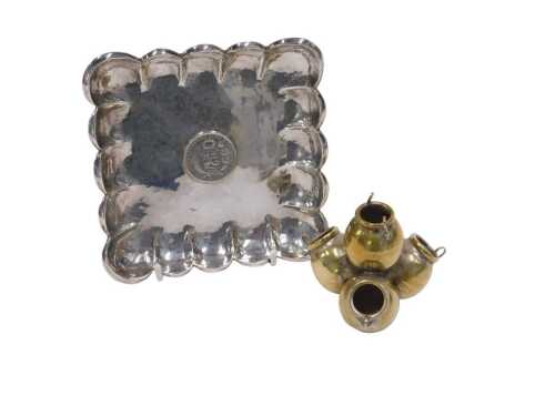 A 20thC Peruvian dish, of shaped square form, centred by a 1/2 Sol coin, dated 1916, marked Peru...