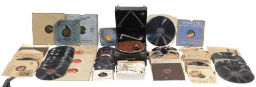 A vintage Columbia tabletop or picnic gramophone, of rectangular form, in pressed leather case,...