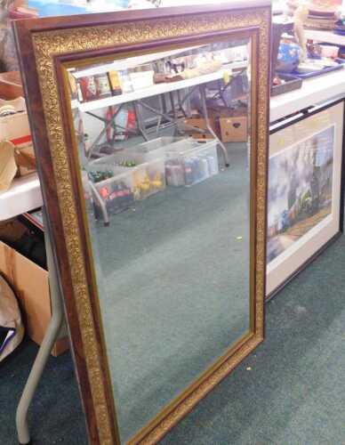 V - A rectangular wall mirror. Note: VAT is payable on the hammer price of this lot at 20%.