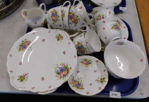 A Royal Doulton florally pattern part tea service, to include serving pieces, slop bowl, cups,...