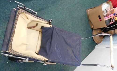 A vintage four wheel pram.