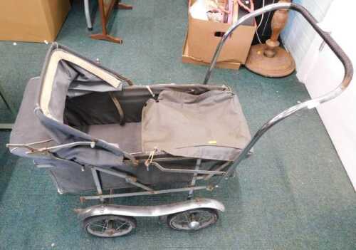 A vintage four wheel pram.