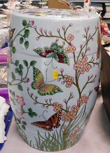 A Pastimes ceramic barrel, transfer printed with leaves and butterflies.