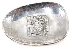 An early 20thC Peruvian dish, of egg shaped form, with hammered border and raised central... - 3