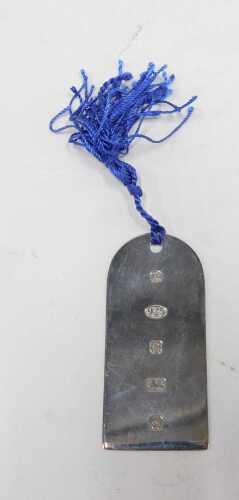 An Elizabeth II sterling silver bookmark.