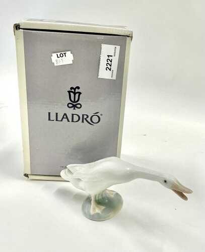 A Lladro figure goose, 9cm high, boxed.