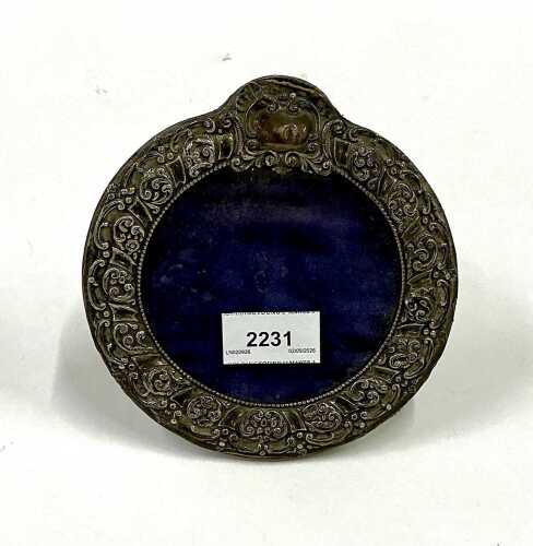 A George V part silver photograph frame. (AF)