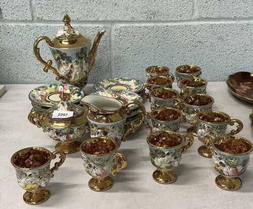 A Capodimonte part coffee service, to include coffee pot, two handled sugar bowl, plates,...