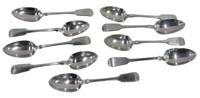 A set of nine William IV Irish silver table spoons, plain Fiddle pattern, by Philip Weekes,...