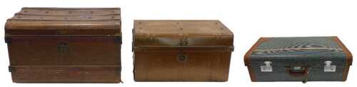 An early 20thC domed top tin trunk, with part studded top and lock, 43cm high, 73cm wide, 49cm...