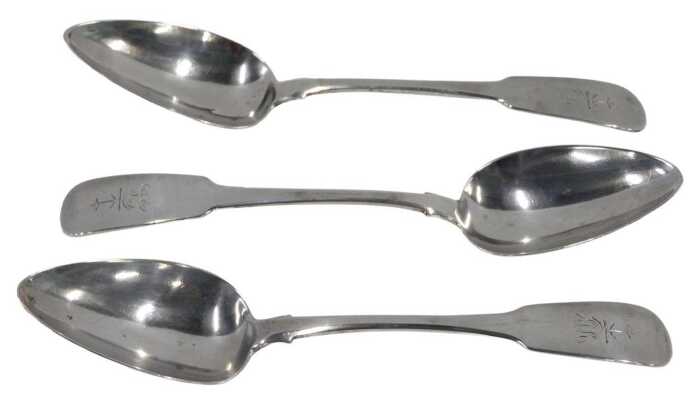 A set of three George III Irish silver tablespoons, Fiddle pattern with anchor crests, by...