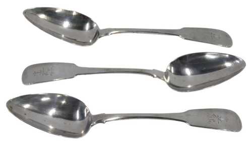 A set of three George III Irish silver tablespoons, Fiddle pattern with anchor crests, by...