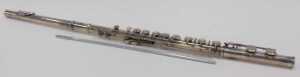 An Elizabeth II three piece silver flute, with articulated stops, numbered 8921 and marked... - 2