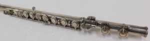 An Elizabeth II three piece silver flute, with articulated stops, numbered 8921 and marked... - 5