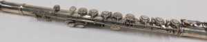 An Elizabeth II three piece silver flute, with articulated stops, numbered 8921 and marked... - 6