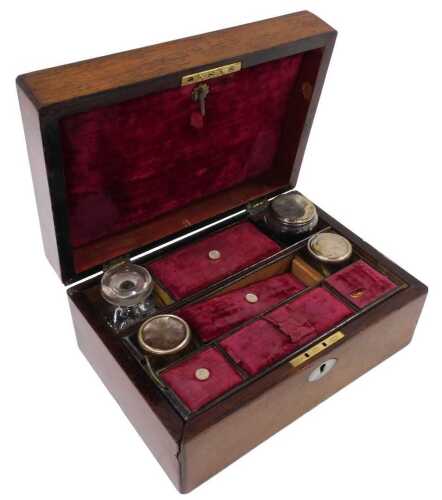 A 19thC rosewood travel box, of rectangular form, with oval mother-of-pearl cartouche marked...
