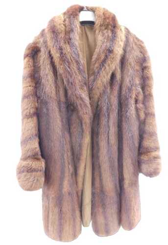 A 20thC lady's fur coat, three quarter length, partially lined, unlabelled, size unknown.