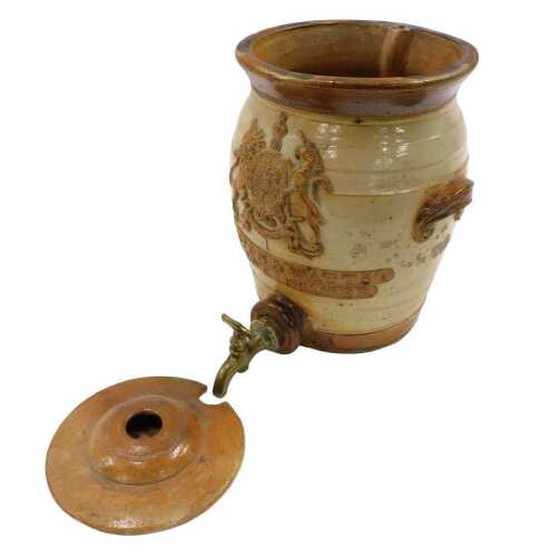 A late 19thC Doulton stoneware water filter, of cylindrical form, with moulded handles and...