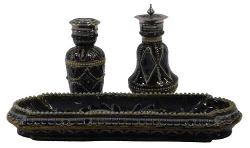 A 19thC Doulton Lambeth stoneware pen stand, of shaped oblong form with a bead outline,...