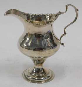 A George III silver cream jug, with plain spout, flared rim, acanthus leaf ear shaped handle,... - 2