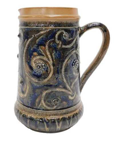 An early 20thC Doulton Lambeth stoneware jug, with plain spout, strapwork handle, and...