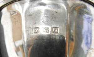 A George V silver miniature trophy, with plain shaped handles, inverted egg shaped body, and... - 3