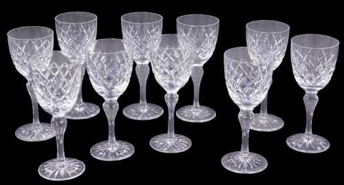 A set of ten 20thC crystal wine glasses, each egg shaped bowl with a repeat hobnail cut...
