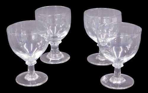 Four 19thC glass rummers, each with plain bowls, on turned stems and circular feet, 14cm high....