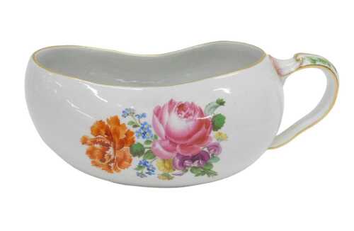 A 20thC Meissen porcelain bourdaloue, with acanthus leaf handle and slipper shaped body,...