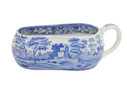 A Copeland pottery bourdaloue, of slipper shaped form with plain handle, transfer printed with a...
