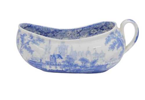 A 19thC English pottery bourdaloue, with plain handle and slipper shaped body, profusely...