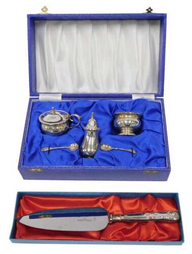 An Elizabeth II silver cruet set, comprising mustard pot, open salt, pepper pot and two spoons,...