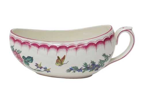 A 19thC Faiencerie de Gien pottery bourdaloue, with thumb mould handle and slipper shaped body,...