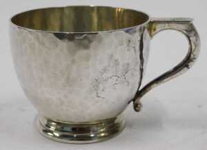 A George V silver overlaid cup, of circular form, with shaped handle, on circular foot, by... - 2