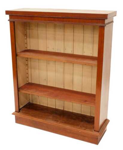 A 20thC mahogany open bookcase, of rectangular form, with adjustable shelves, on a plain block...