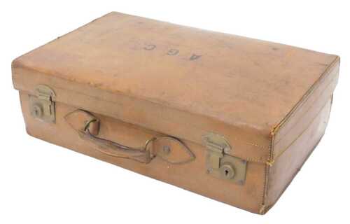 An early 20thC tan leather travel case, of rectangular form, with gilt metal locks and leather...