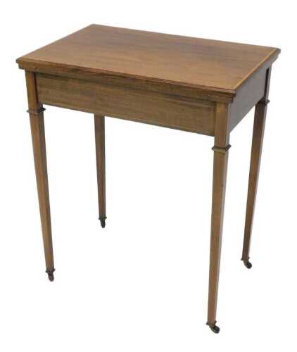 An Edwardian mahogany Sheraton Revival fold over card table, of rectangular form, the top with a...