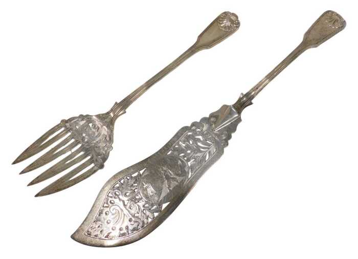 A pair of Victorian silver fish servers, shell capped Old English pattern, by Thomas Wallis II,...