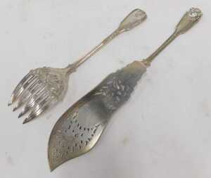 A pair of Victorian silver fish servers, shell capped Old English pattern, by Thomas Wallis II,... - 2
