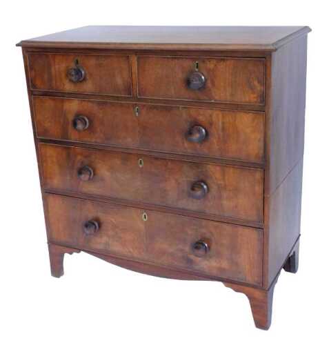 V - A Victorian mahogany narrow chest, of two short and three long cock beaded drawers, on splayed...